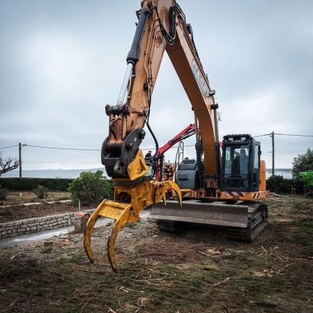 Grappin forestier vahva rotatif sur pelle hydraulique